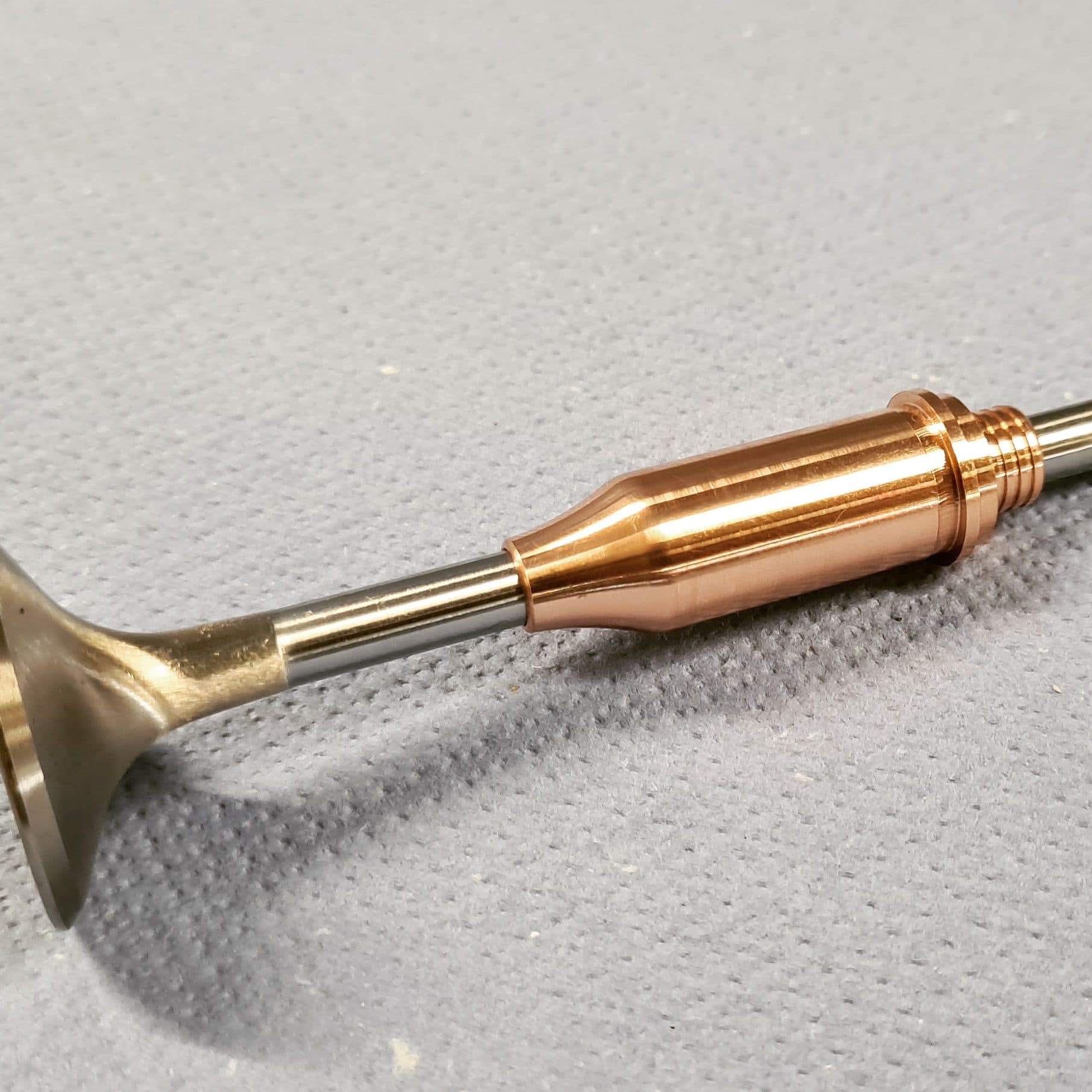 CNC turning of a valve guide from bar stock on the lathe