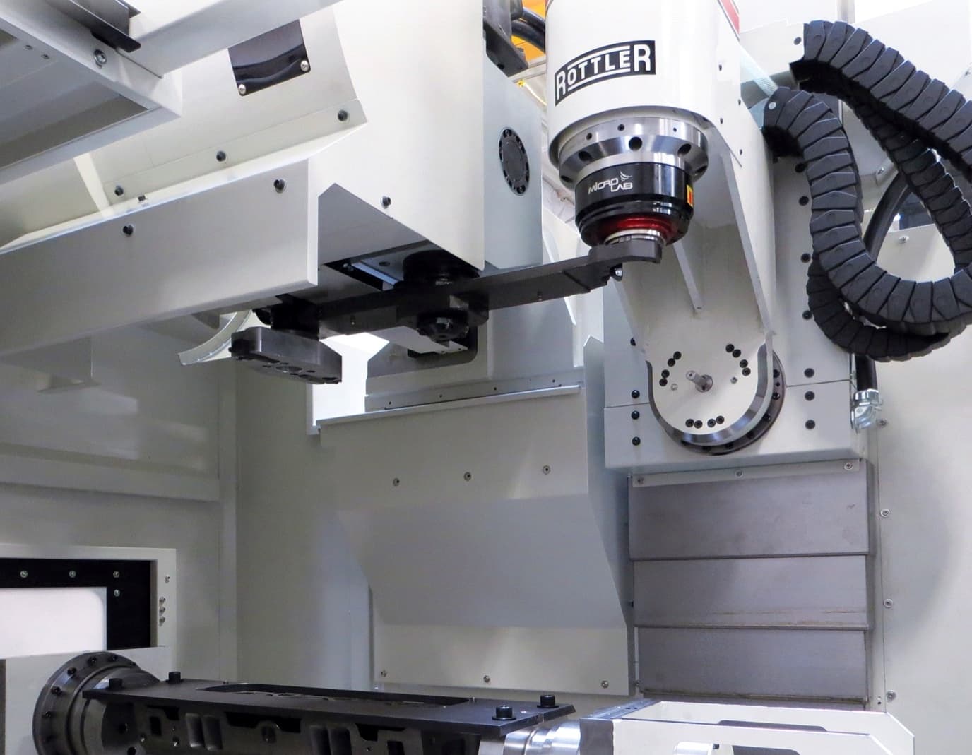 5-axis CNC machining center milling a cylinder head port