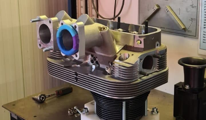 Cylinder head being machined, prepared for flow measurement