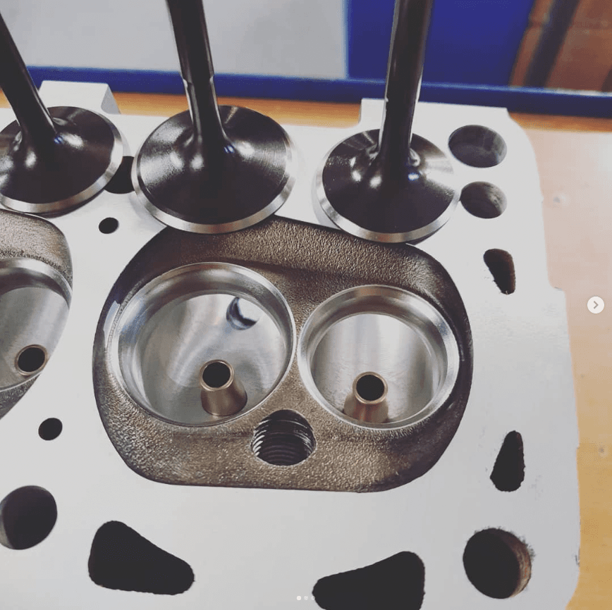 New intake valve in a CNC-machined cylinder head port